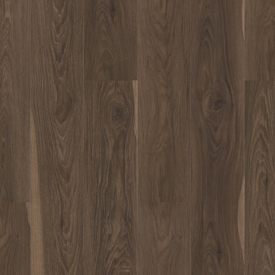 Pantheon HD Plus 7" Vinyl features a dark brown wood look with natural grain and knots, offering a smooth, polished surface. The closely aligned planks create a seamless, elegant appearance for any space.