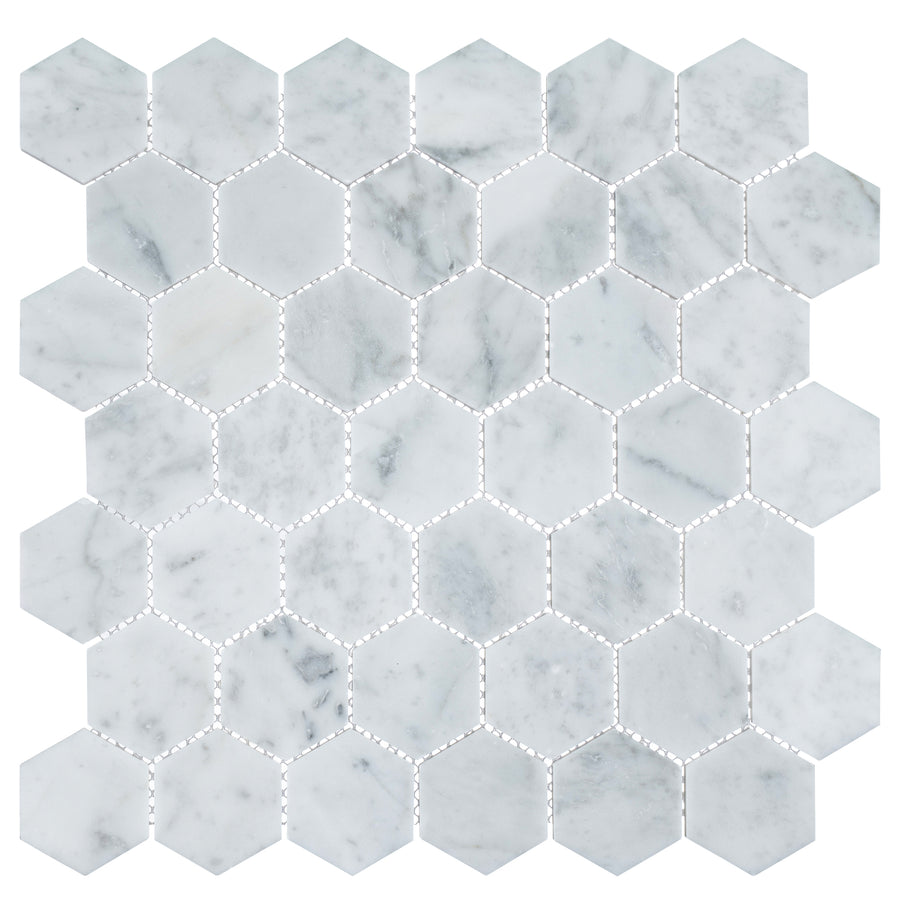 Colonial 2" Hexagon Ceramic Tile in Captains Manor features a clean hexagonal pattern with subtle gray veining, creating an elegant and timeless mosaic design for any space.