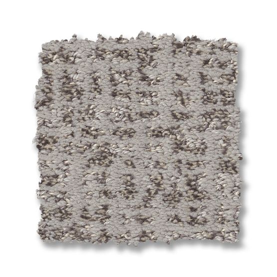 A square swatch of Caboodle On Trend Carpet in Solitude, featuring a soft, plush surface with light gray tones and darker gray and beige flecks in a subtle mottled pattern.