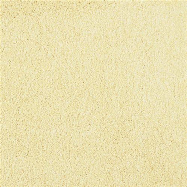 A close-up of Oceanside Family Friendly Carpet in Calla Lily color reveals a smooth, pale yellow surface with a fine, even texture—reminiscent of plush flooring perfect for families.