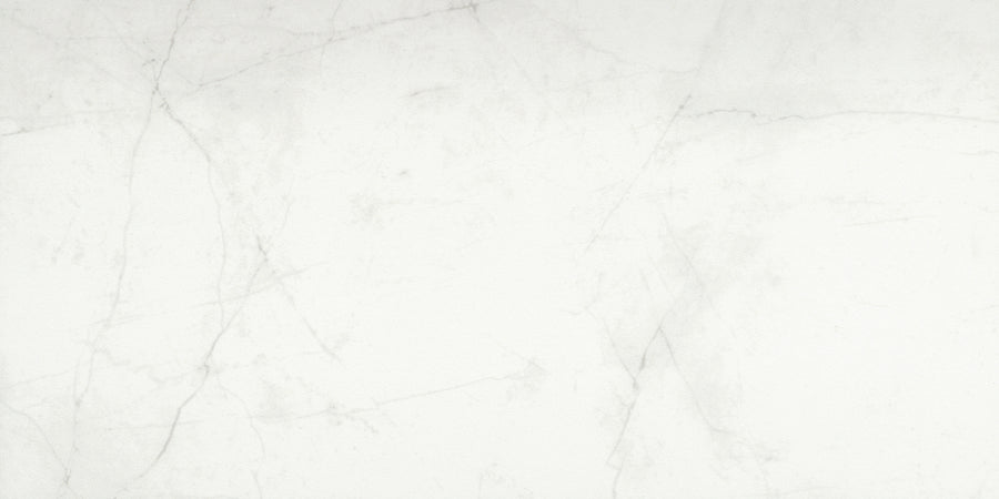 The Callie 12x24 Polished Porcelain Tile in Snow features a light gray marble look with subtle, thin, irregular dark gray veining for a natural, elegant appearance.