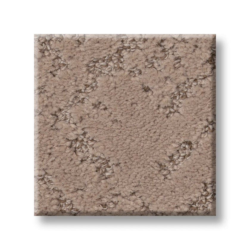 A square sample of Sincere Focus On Trend Carpet, light brown with a subtle pattern and a mix of short and slightly longer fibers, shown on a white background.