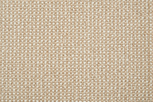 Close-up of Harper Berber Carpet in Canvas color, featuring a beige woven texture with tightly interlaced fibers in a grid pattern, emphasizing its everyday durability and comfortable feel.