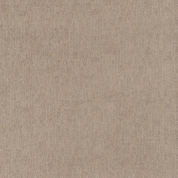 A close-up of Sneak Peak Berber Carpet in Canyon Dust showcases its dense pile and subtle vertical linear patterns, offering a soft, uniform appearance that's ideal for durable flooring.
