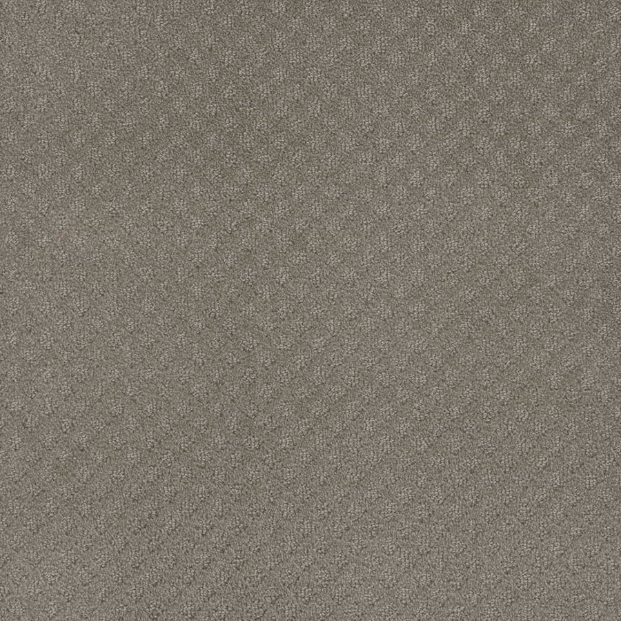 Close-up of Capri Pet Friendly Carpet in Stratosphere, featuring a textured gray surface with a subtle diamond pattern for a soft, durable look ideal for homes with pets.