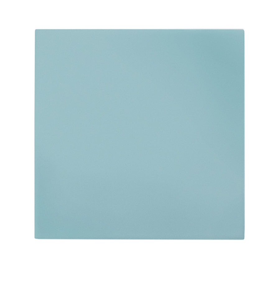 The Casbah 5" x 5" Ceramic Tile in Sky features a plain, square design and solid light blue color, shown on a white background. Perfect for accent walls or pairing with Moroccan-inspired patterns.