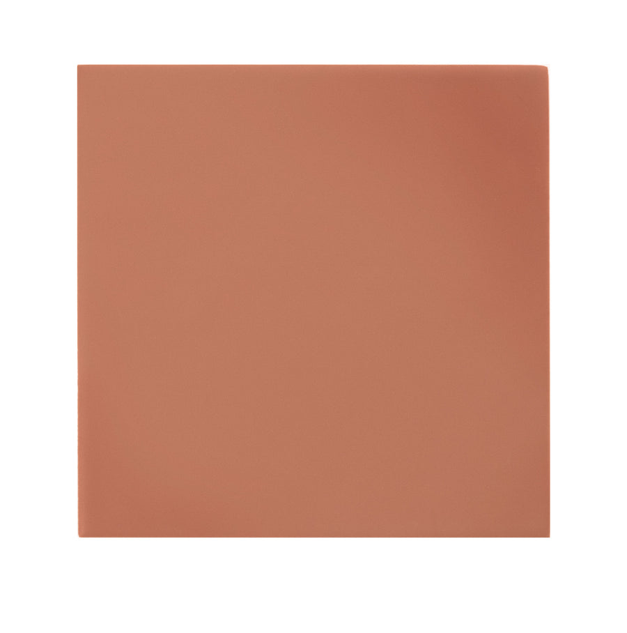 The Casbah 5" x 5" Ceramic Tile in terracotta features a smooth, matte surface and square shape, ideal for accent walls, shown against a white background.
