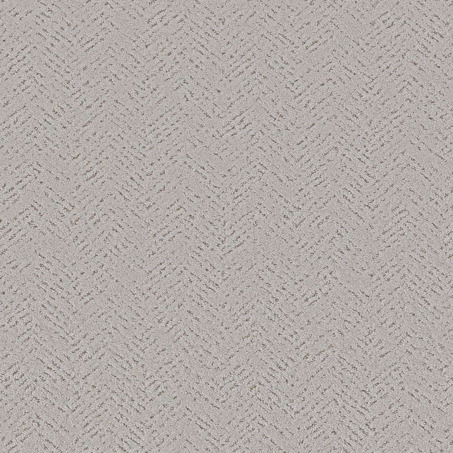 Favoured Path Pet Friendly in Cashmere features a light gray textured surface with a subtle herringbone pattern and speckled accents. This durable flooring provides a clean, uniform look perfect for contemporary spaces and is ideal for pet-friendly homes.