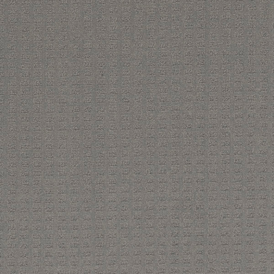 A close-up of Caspian Berber Carpet in Bayside, featuring a subtle small square grid pattern on textured gray fabric, crafted from premium fibers for enhanced durability and a stain-resistant finish.