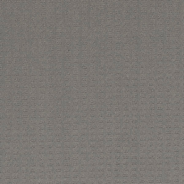 A close-up of Caspian Berber Carpet in Bayside, featuring a subtle small square grid pattern on textured gray fabric, crafted from premium fibers for enhanced durability and a stain-resistant finish.