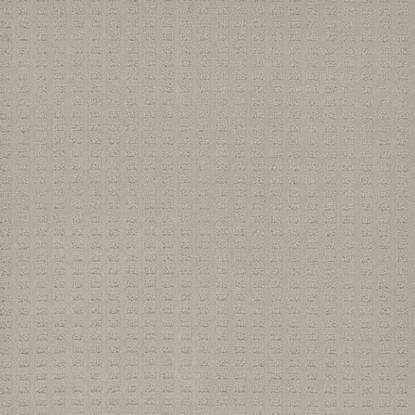 Caspian Berber Carpet in Cloud Nine features light beige textured fabric with a subtle grid pattern. Evenly spaced, small raised squares create a soft, elegant geometric look. Crafted from premium fibers, it’s both stylish and stain-resistant.