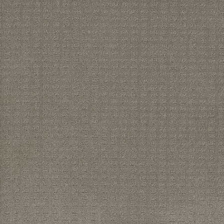 Close-up of Caspian Berber Carpet in Stratosphere, featuring a textured gray surface with a subtle grid-like waffle pattern. Crafted from premium fibers for a raised, tactile appearance that evokes classic Berber sophistication.
