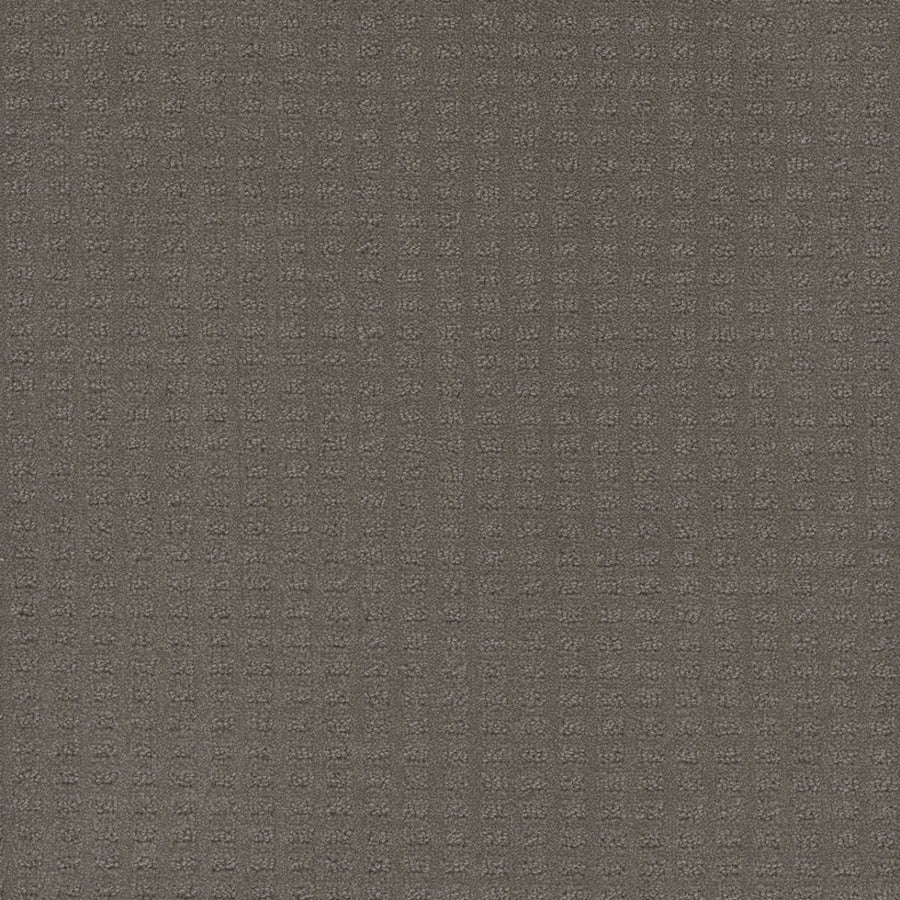 Caspian Berber Carpet in Ultramarine features premium fibers with a subtle grid pattern of small, evenly spaced squares, creating a uniform and neutral look.