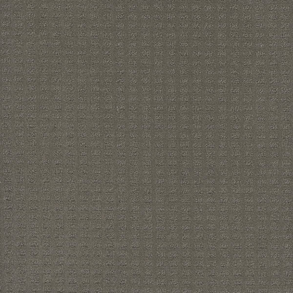 Caspian Berber Carpet in Ultramarine features premium fibers with a subtle grid pattern of small, evenly spaced squares, creating a uniform and neutral look.