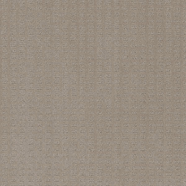 Close-up of Caspian Berber Carpet in Warm Sand—a beige, woven design featuring a subtle geometric grid. Crafted from premium fibers, its soft, gently raised texture gives the surface a tactile, three-dimensional feel.