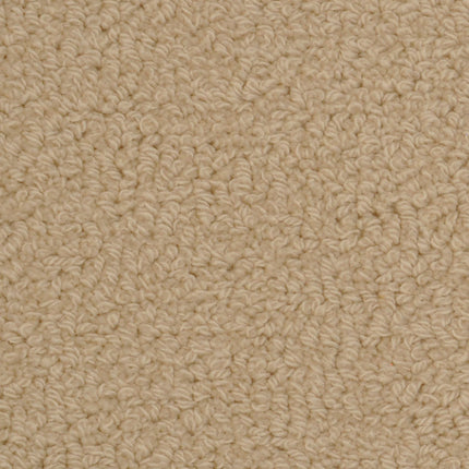 Close-up of the Savant Berber Carpet in Castle color, featuring a looped pile with tightly woven, slightly curly fibers—perfect for high-traffic areas thanks to its durable design.