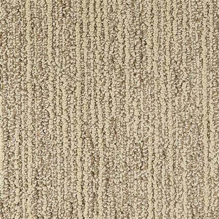 Close-up of Advocate Berber Carpet in Champion color, featuring a beige, textured looped pile with subtle vertical lines. Its dense fibers create a durable, cozy surface with a soft, slightly patterned and neutral appearance.