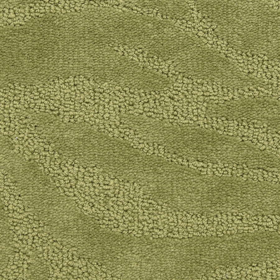 Close-up of Capetown On Trend Carpet in Chapman'S Peak color, featuring raised, looped fibers and a subtle wavy texture with varied green tones—luxurious durability ideal for high-traffic spaces.