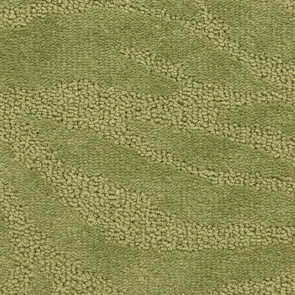 Close-up of Capetown On Trend Carpet in Chapman'S Peak color, featuring raised, looped fibers and a subtle wavy texture with varied green tones—luxurious durability ideal for high-traffic spaces.