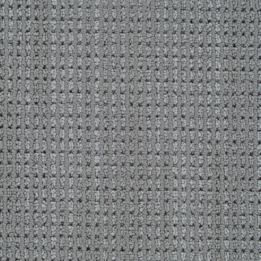 Close-up of Top Notch Berber Carpet in Charcoal, featuring a grid-like woven texture with small raised squares and darker lines. This stylish, stain-resistant material offers a subtle geometric look reminiscent of classic Berber designs.