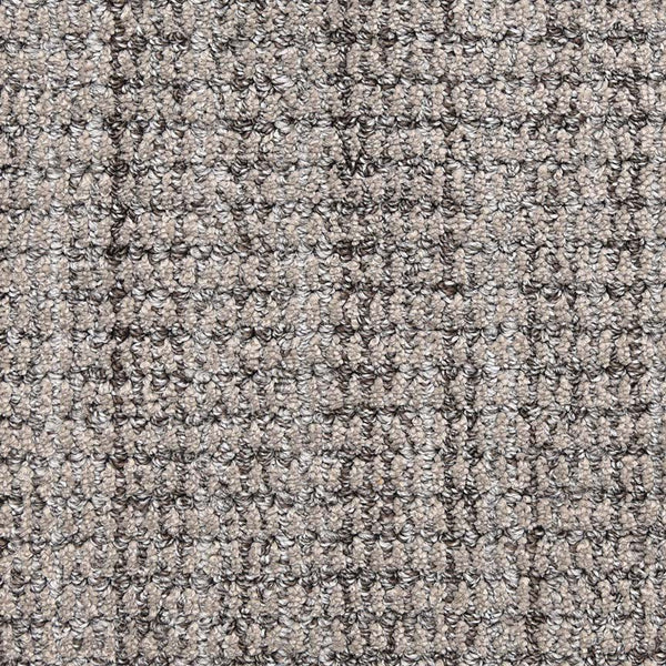 Close-up of Aspen Berber Carpet in charcoal, highlighting its textured, looped surface with a subtle checkered pattern that is slightly rough yet durable.