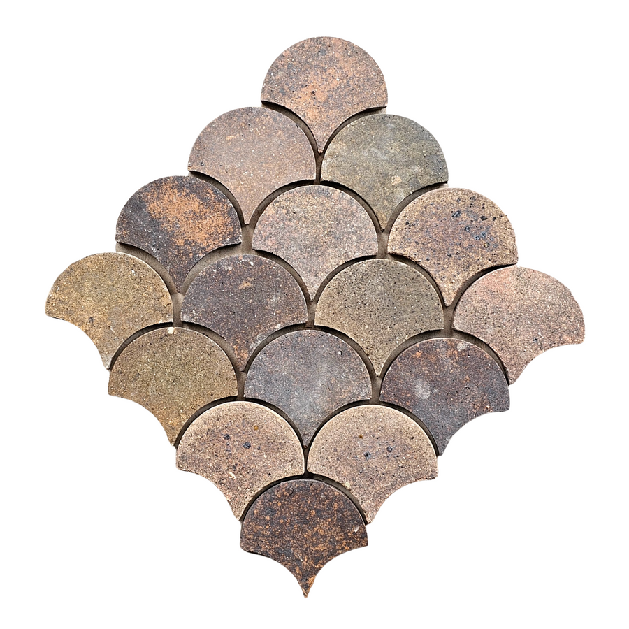 Inspired by Atelier Clay Scale Mosaic Natural Stone, a diamond formation of interlocking, fan-shaped tiles in varied brown tones is displayed on a white background.