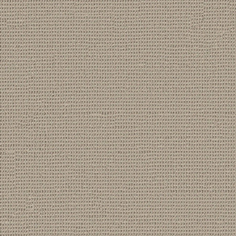A close-up of Knitted Tone Pet Friendly Carpet in Chateau, featuring a beige waffle-textured weave with a grid pattern, crafted from premium materials for a soft feel and natural look.