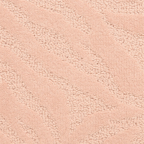 Close-up of Capetown On Trend Carpet in Chiappini St.: a soft, light pink fabric with a plush, looped wavy texture—perfect for bringing comfort and luxury style to high-traffic areas.