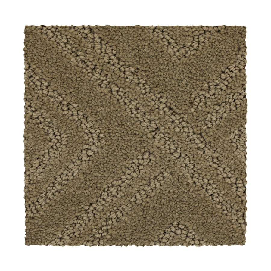 Classic Frame Family Friendly Carpet in Rum Cream features a textured, tan square swatch with a raised crisscross pattern and thick looped fibers for a plush, stylish, and family-friendly look.