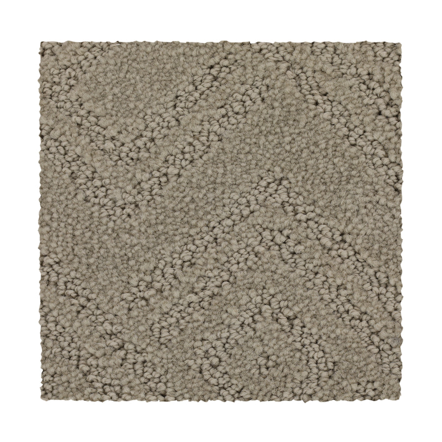 A rectangular swatch of Classic Frame Family Friendly Carpet in Sand Dollar, featuring a textured, raised chevron pattern on a white background.