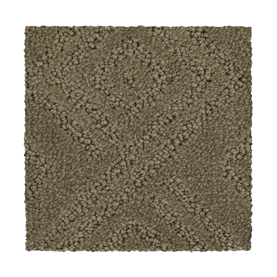 A rectangular swatch of Classic Frame Family Friendly Carpet in Driftwood, featuring a textured surface with a raised diamond and X pattern.