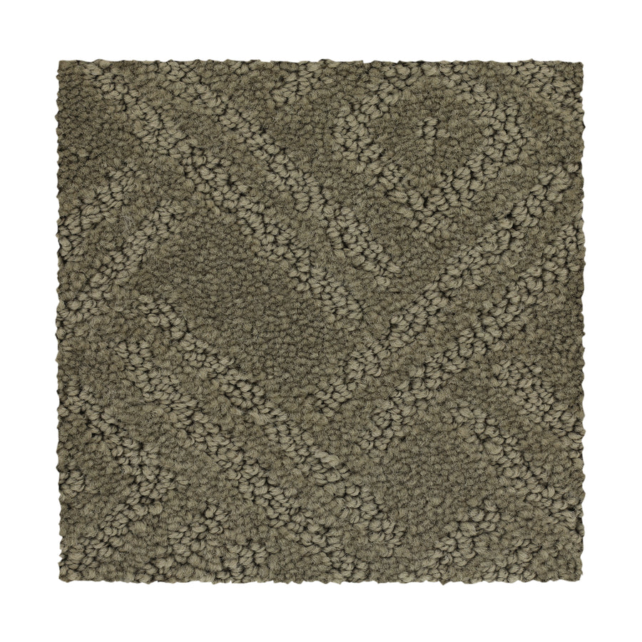 Classic Frame Family Friendly Carpet in Earth Tone features a textured, durable rectangular swatch with a raised geometric pattern of diagonal and intersecting lines—ideal for family spaces.