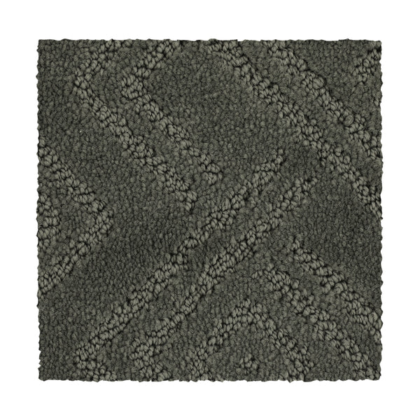 Classic Frame Family Friendly Carpet in Stonework is a durable square sample with a raised geometric pattern, diagonal lines, and textured loops—perfect for family-friendly spaces.