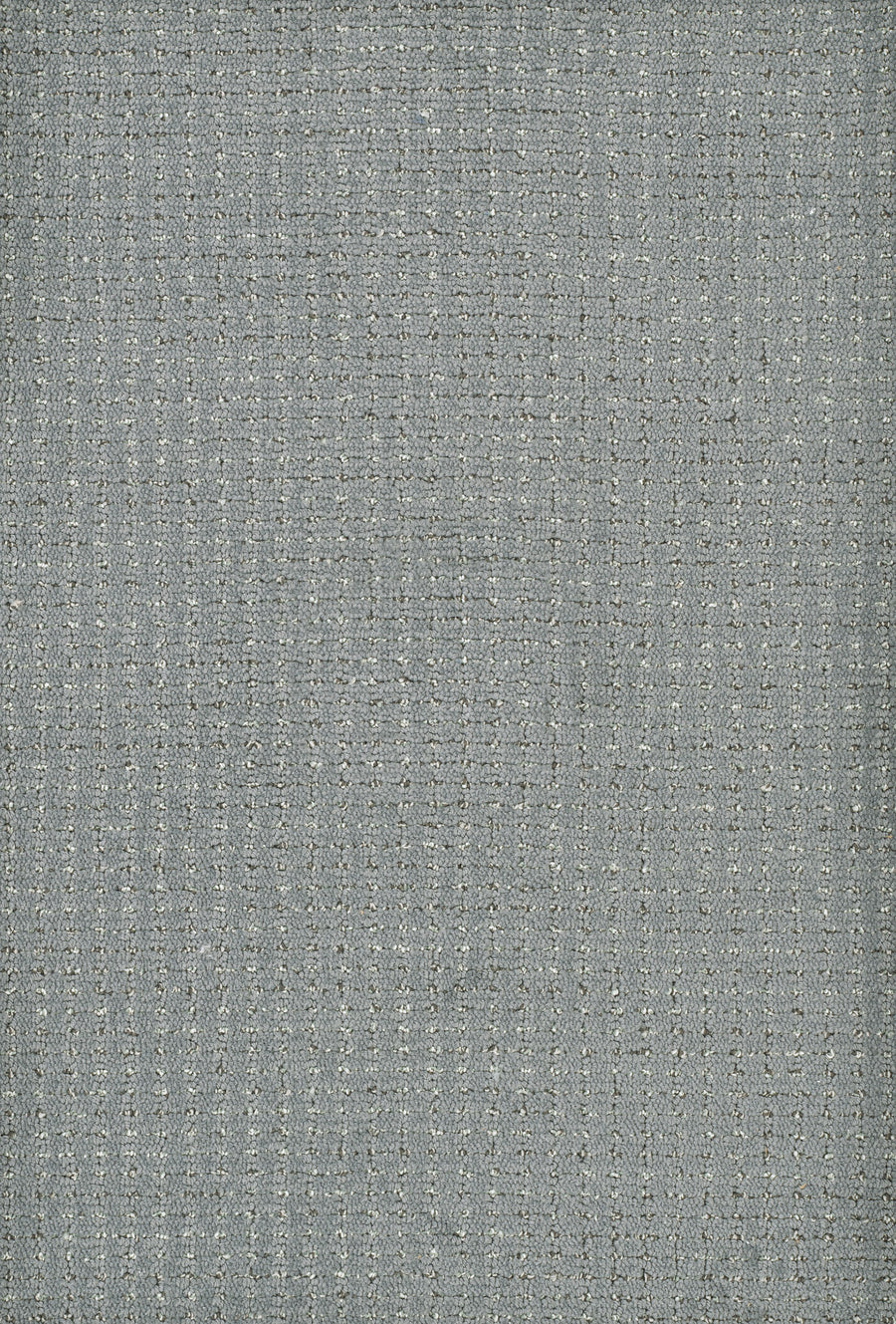 Close-up of Chalet On Trend Carpet featuring textured gray fabric with organic lines and a subtle woven pattern. The uniform surface offers a slightly rough yet luxurious appearance, capturing the essence of this premium carpet.