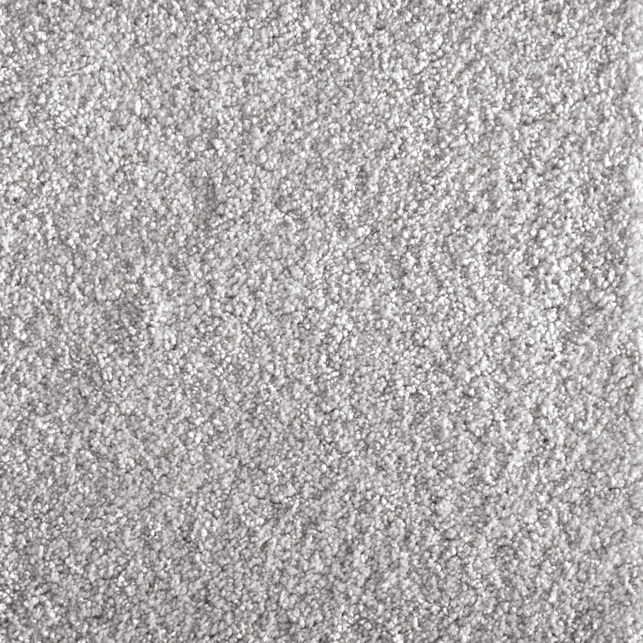Close-up of Jazzy Family Friendly Carpet in Cloud color, featuring a soft, dense pile and textured surface. The uniform plush fibers create an elegant look, making it an ideal flooring choice for high-traffic areas.