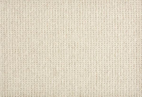Close-up of Martina Berber Carpet in Cloud, featuring a beige woven fabric with a subtle grid pattern and slightly rough texture. Its tight weave adds contemporary style, making it ideal as a simple, neutral background for high-traffic areas.