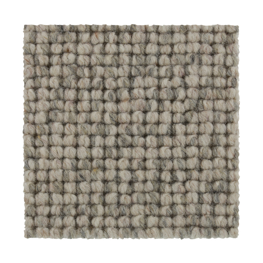 A close-up of a square swatch of Collanmore Berber Carpet in Sweet Briar, showcasing its looped texture and grid-like pattern—perfect for high-traffic areas and premium flooring needs.