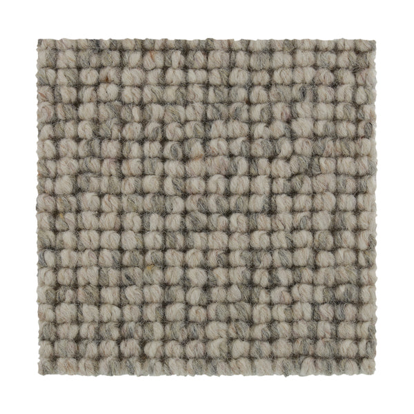 A close-up of a square swatch of Collanmore Berber Carpet in Sweet Briar, showcasing its looped texture and grid-like pattern—perfect for high-traffic areas and premium flooring needs.