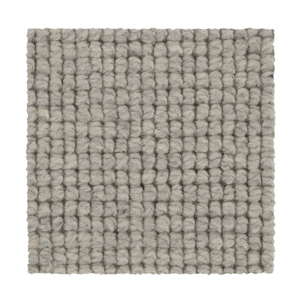 A square sample of Collanmore Berber Carpet in Stardust, featuring a textured, chunky woven loop ideal for high-traffic areas, is shown on a white background.
