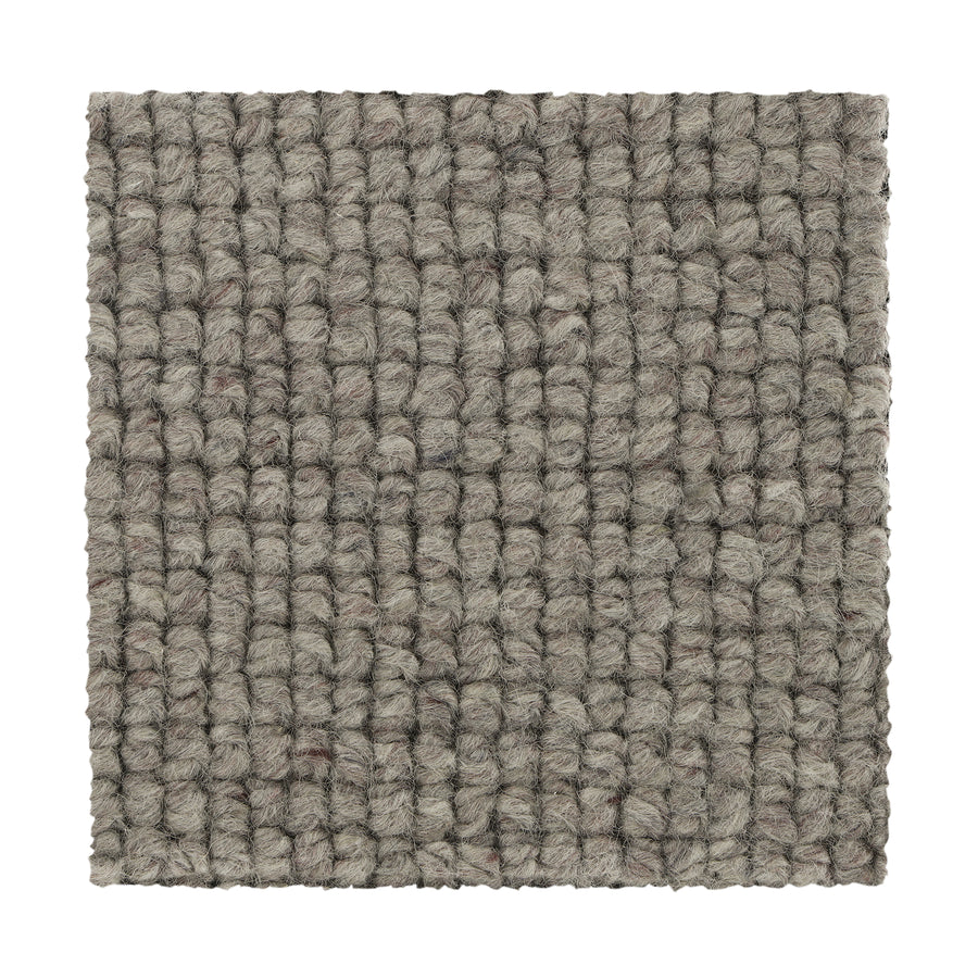 Square sample of Collanmore Berber Carpet in Caspian Gray, showcasing a textured looped grid pattern with tightly woven fibers. Perfect as premium flooring for high-traffic areas. Displayed against a white background.