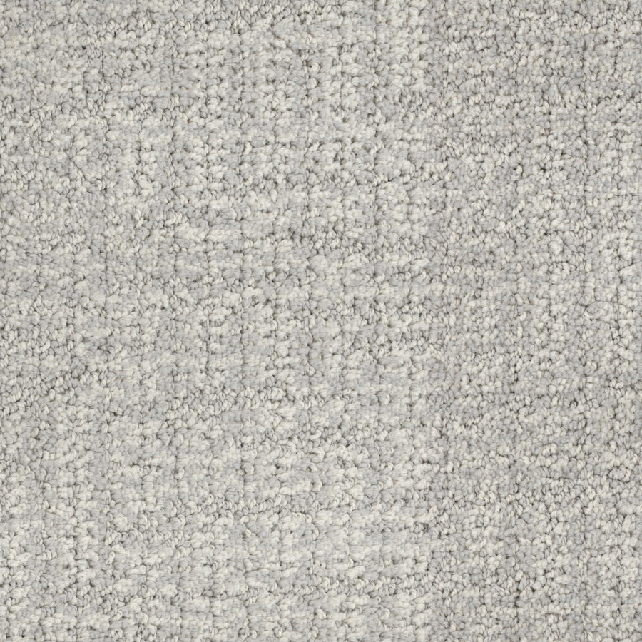 Close-up of Connection Pet Friendly Carpet in light gray, showcasing a subtle cut and loop texture and soft, plush look.