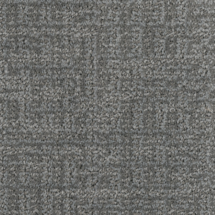 Close-up view of the Connection Pet Friendly Carpet in gray, featuring a subtle cut and loop texture for a soft, slightly varied surface.