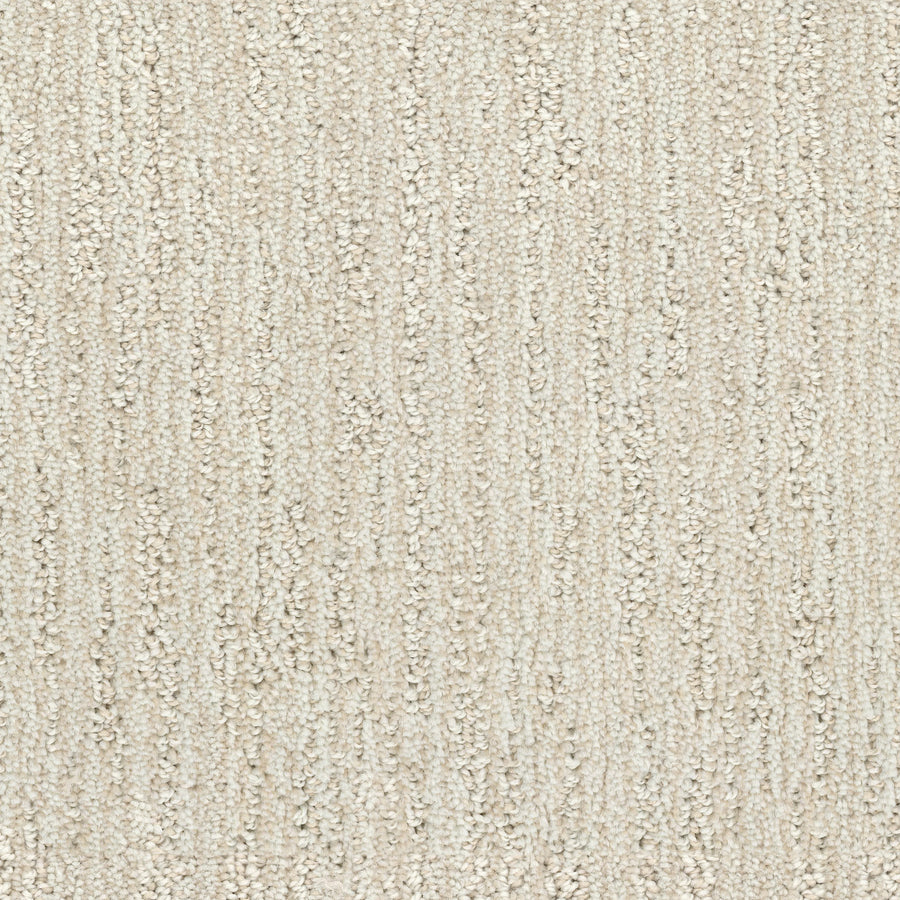 Close-up of Contentment Pet Friendly Carpet in beige, featuring a textured, linear pattern and soft looped pile. Its plush, uniform surface is stain-resistant—perfect for adding comfort and style to homes or offices.