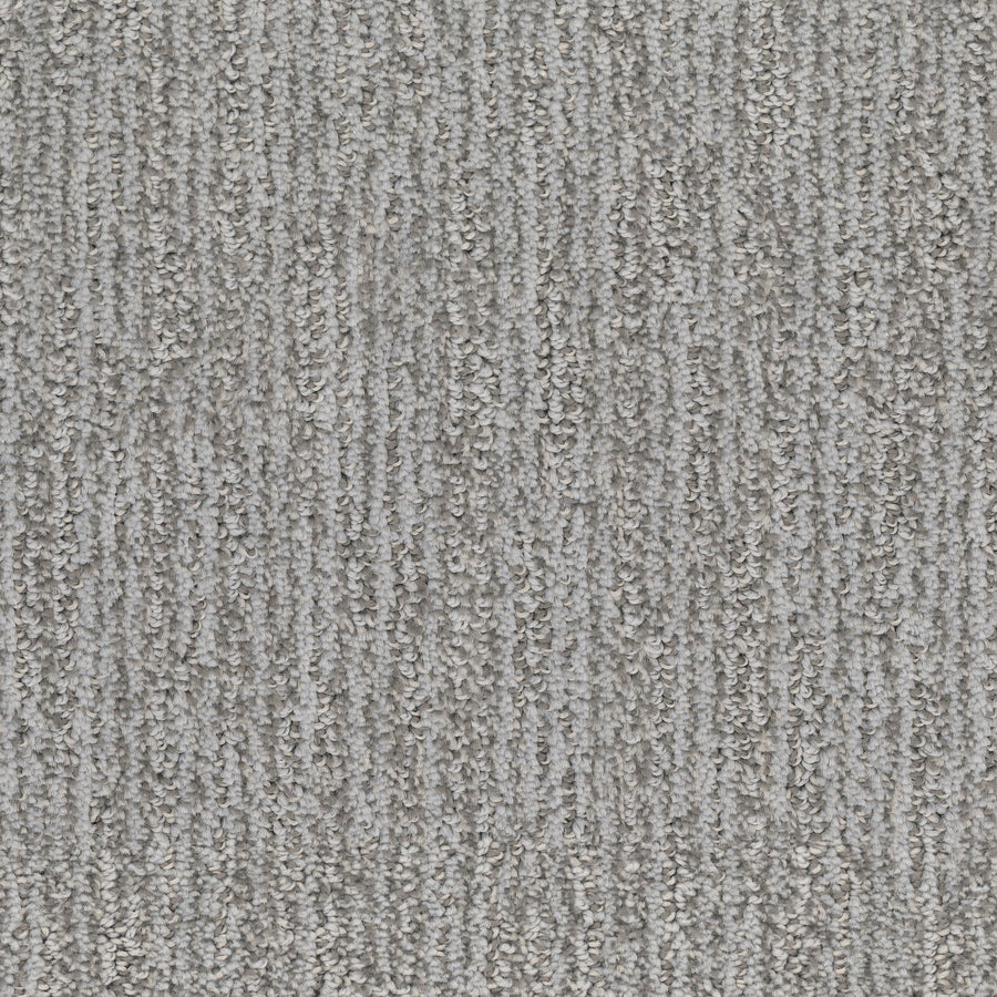 Close-up of Contentment Pet Friendly Carpet, showcasing a textured looped pile with vertical and wavy gray lines. Its soft, dense surface is stain-resistant, offering both style and practicality for modern homes.