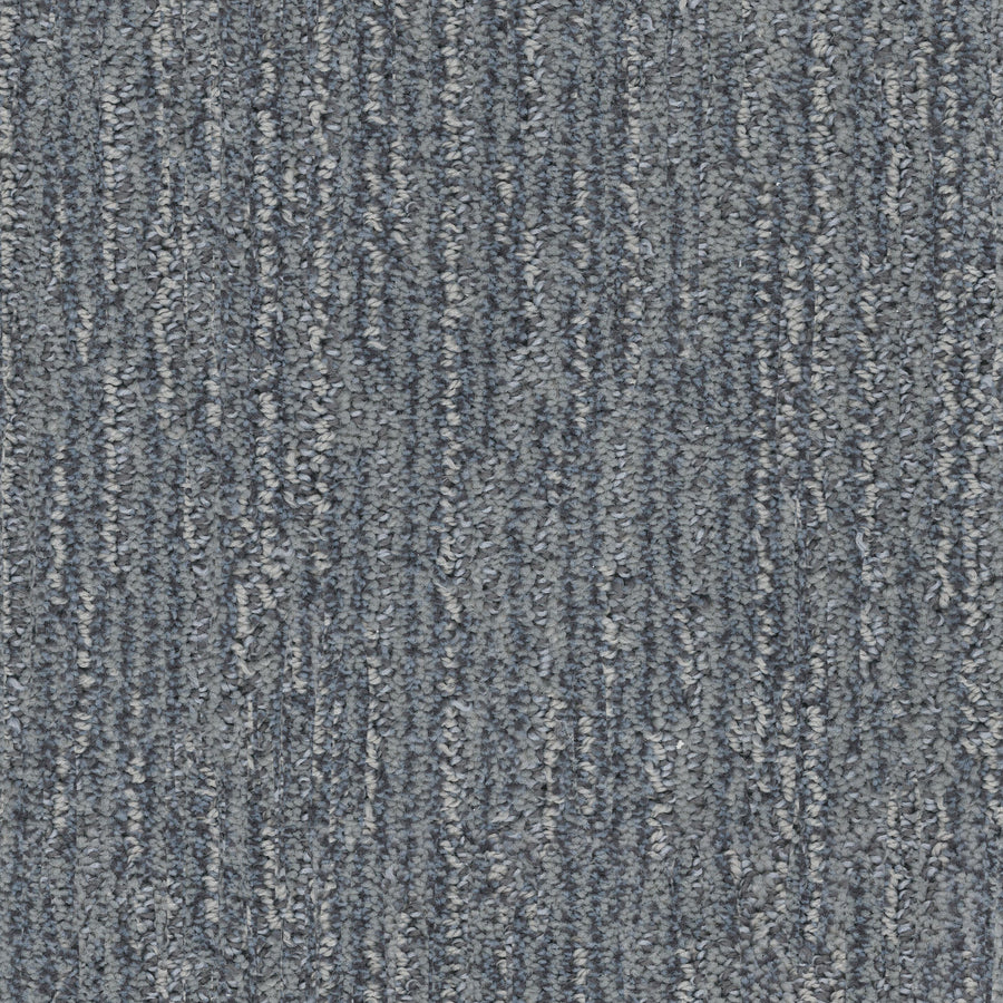 Close-up of Contentment Pet Friendly Carpet in gray and blue, featuring a textured looped fiber surface with subtle vertical streaks for a stylish, striped look. This carpet is both stain-resistant and pet friendly.