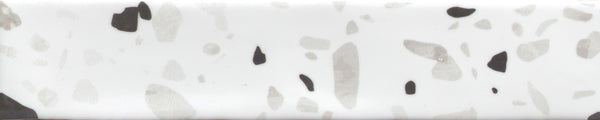 The Fragmento 2x10 Ceramic Tile in Cookies & Cream features irregular gray and black shapes on white, creating a bold terrazzo-inspired pattern perfect for statement walls.