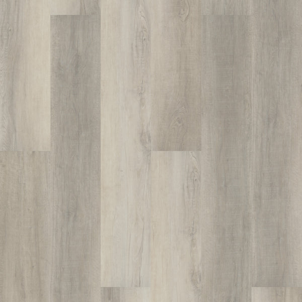 A close-up of Coretec Pro Plus XL Enhanced Vinyl shows light and medium gray wood-look flooring with natural grain, subtle knots, and color variations—perfect for stylish, waterproof floors.