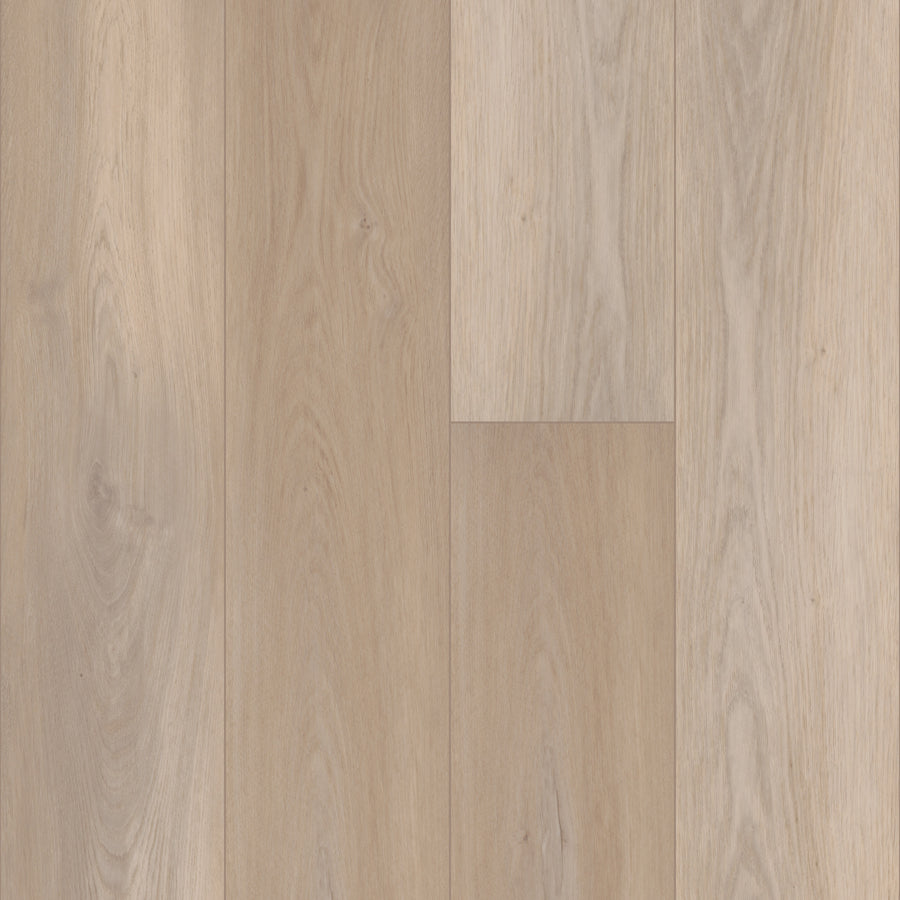 Close-up of Coretec Pro Plus XL Enhanced Vinyl flooring in light oak, showcasing grain patterns and color variations in a staggered plank layout. Enjoy authentic wood and stone looks plus waterproof benefits with this luxury vinyl option.