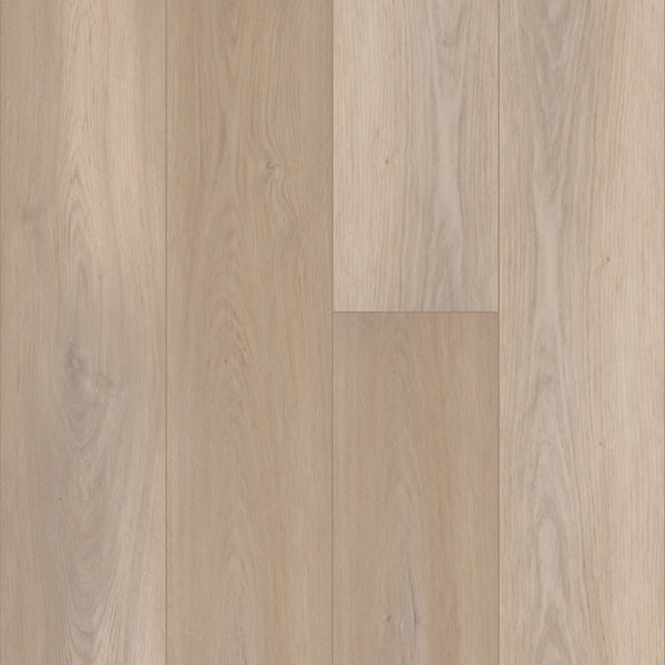 Close-up of Coretec Pro Plus XL Enhanced Vinyl flooring in light oak, showcasing grain patterns and color variations in a staggered plank layout. Enjoy authentic wood and stone looks plus waterproof benefits with this luxury vinyl option.