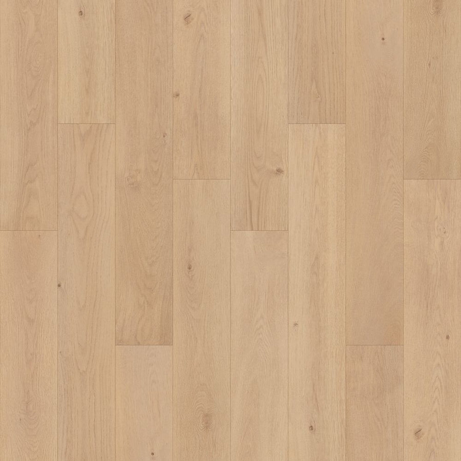 Woodlette Estates 7 1/2" Waterproof Laminate in Cork Oak features a smooth, matte finish with natural grain and subtle knots. Staggered planks create a warm, modern look—ideal for stylish, durable flooring solutions.